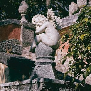 Balancing A Dream Cherub Garden Statue