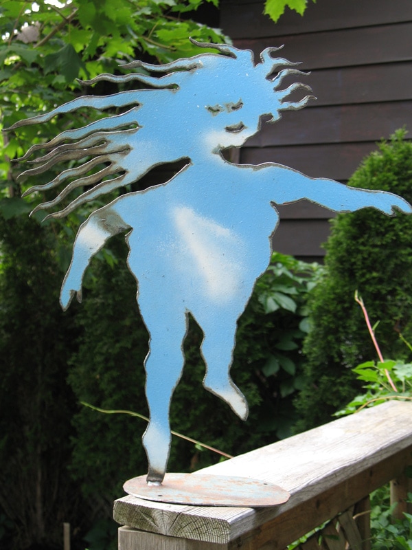 blue metal dancing diva sculpture